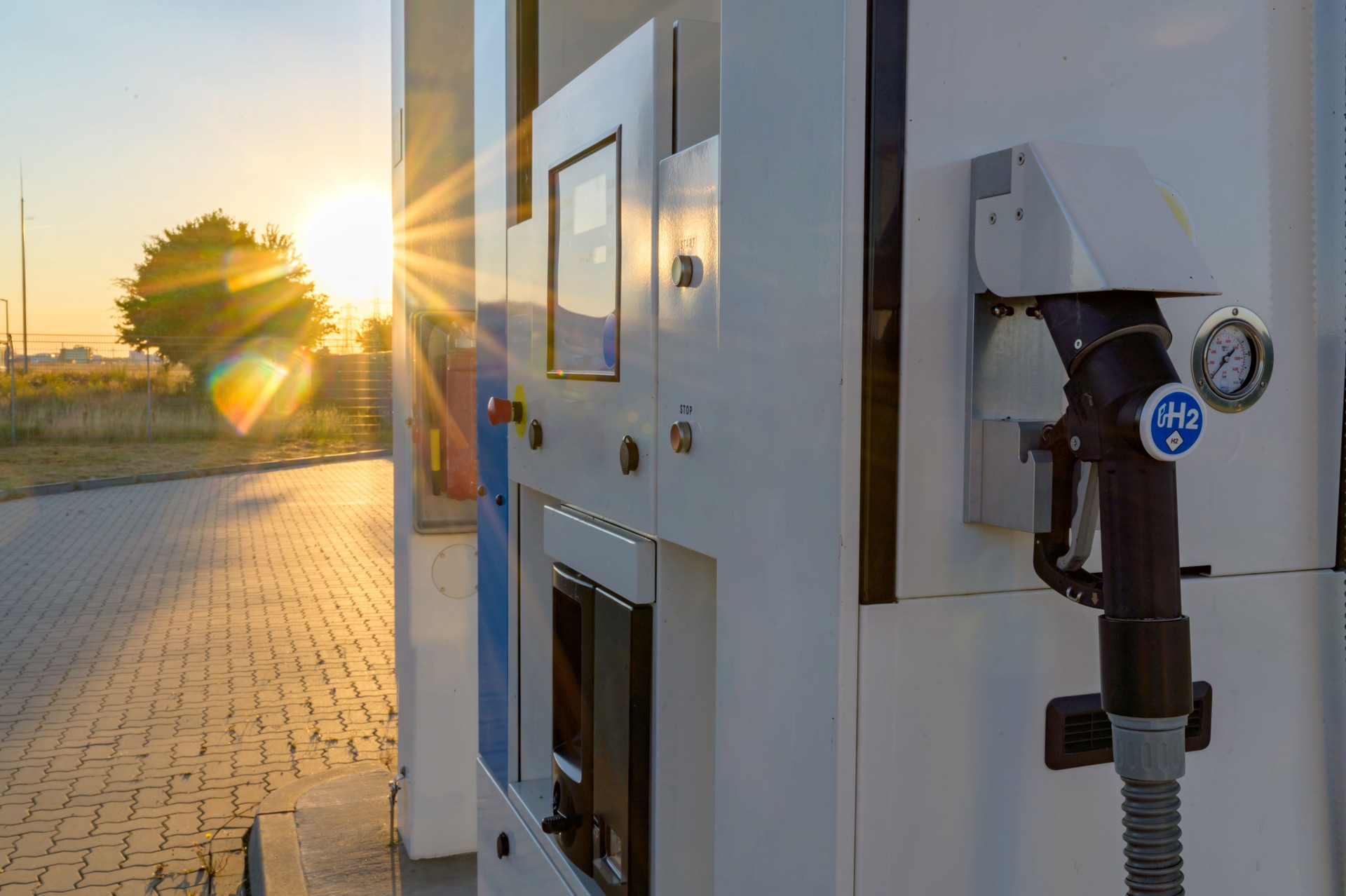 Hydrogen fuel pump for automobiles running on pollution-free hydrogen-powered fuel cells. Hydrogen logo on gas stations fuel dispenser. h2 combustion engine for emission free ecofriendly transport.